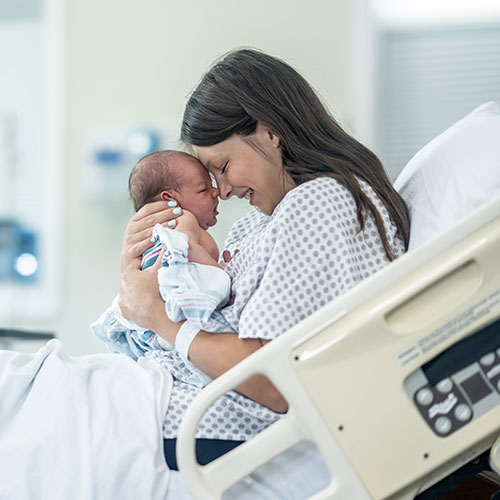 newborn baby with mom
