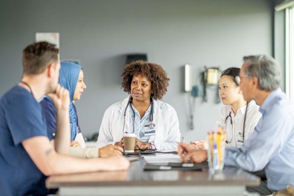 group of people talking at a table