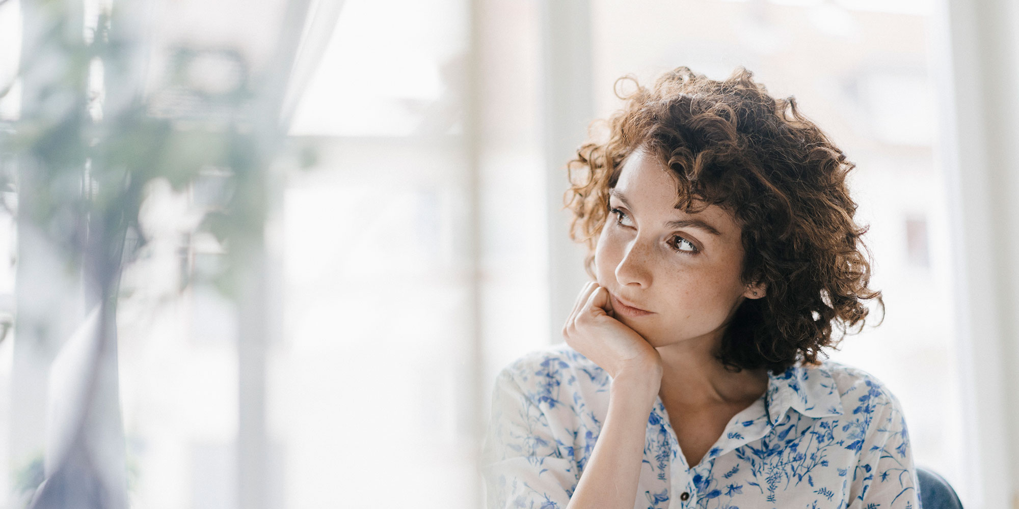 Woman looking thoughtful