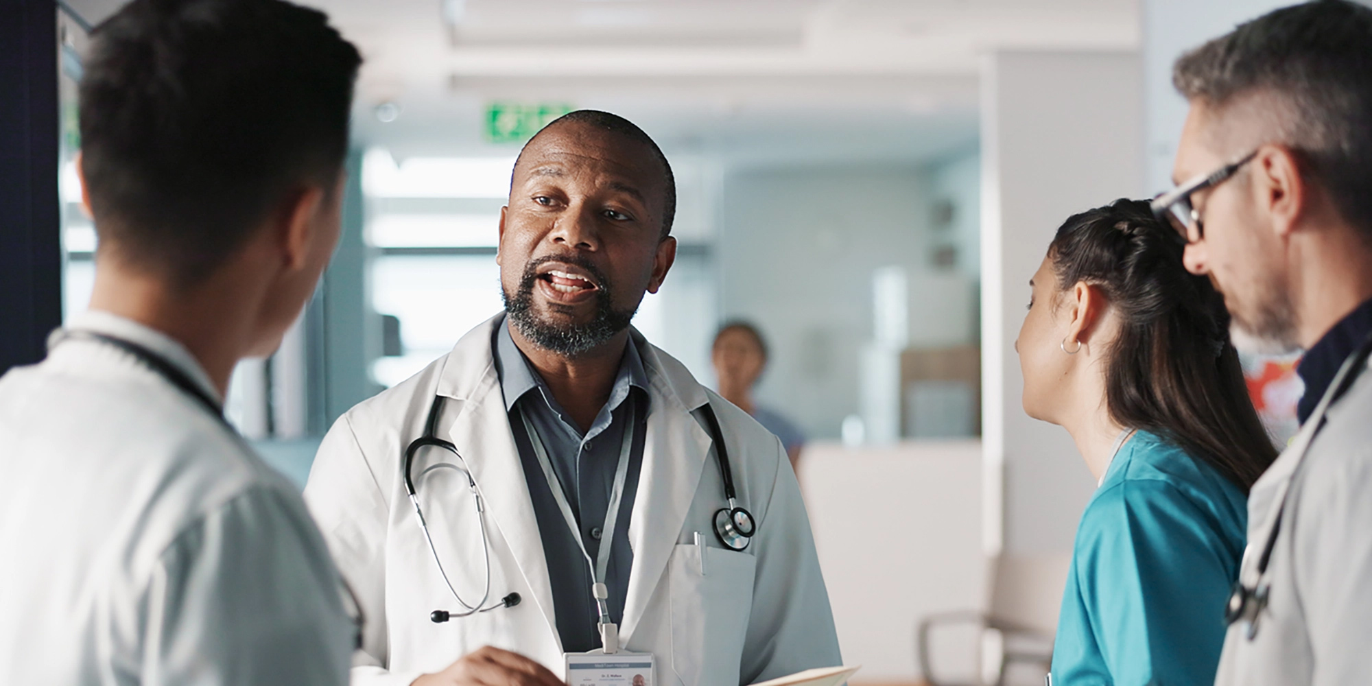 Doctors talking in hallway