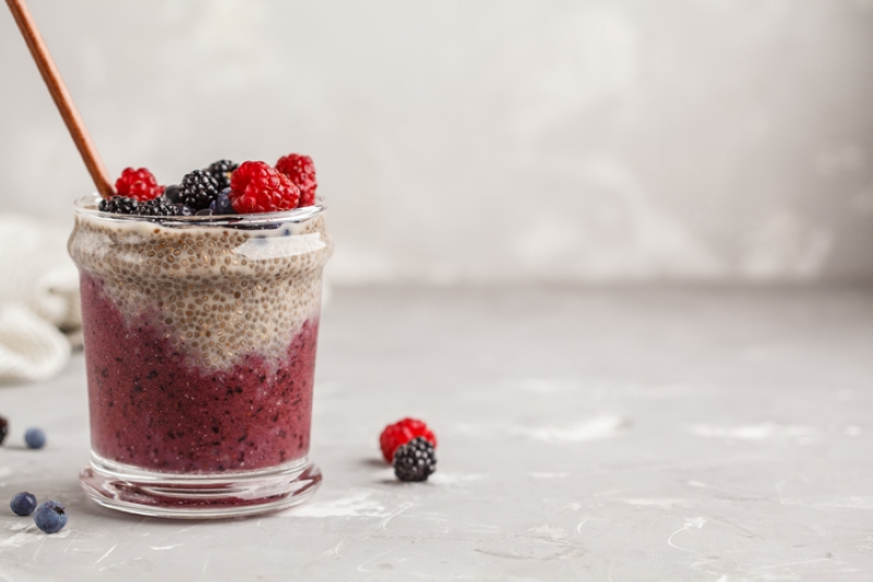 Jar with chia seed pudding and berries